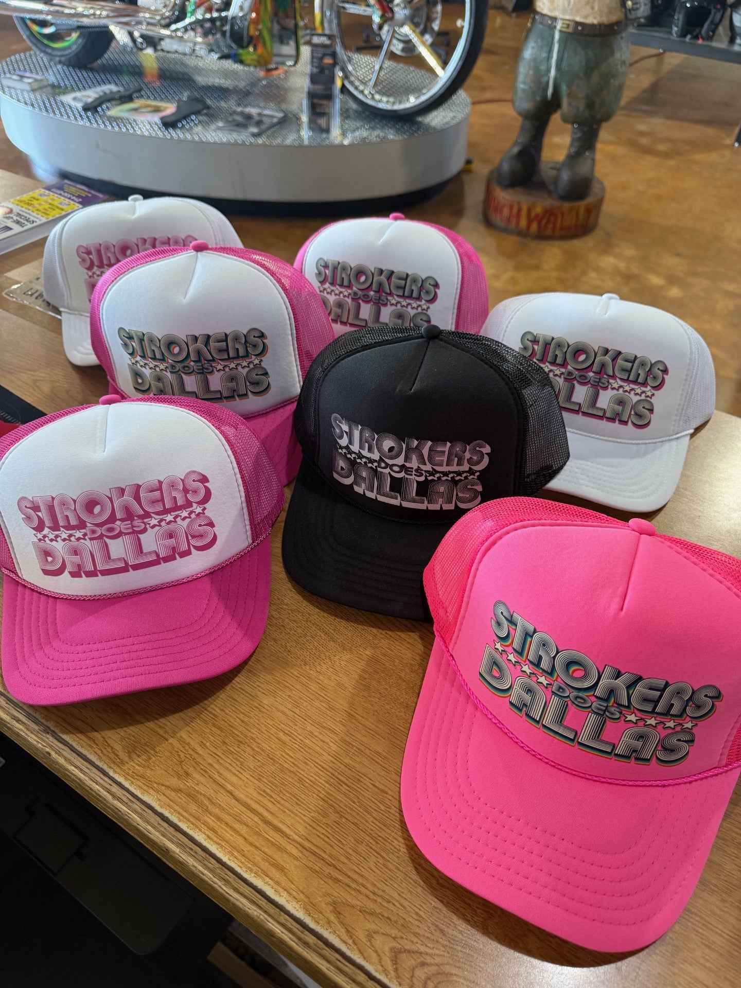 "Strokers Does Dallas" Trucker hats by Bloom